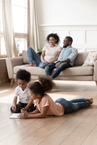family relaxing in living room
